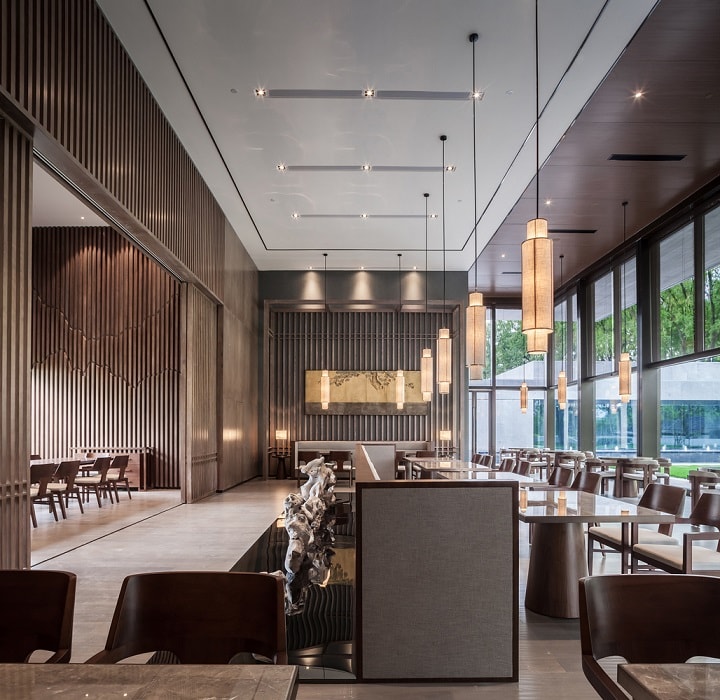 休閑茶樓裝修效果圖—現代門(mén)樓，曲折圓潤的中式藝術(shù)裝置